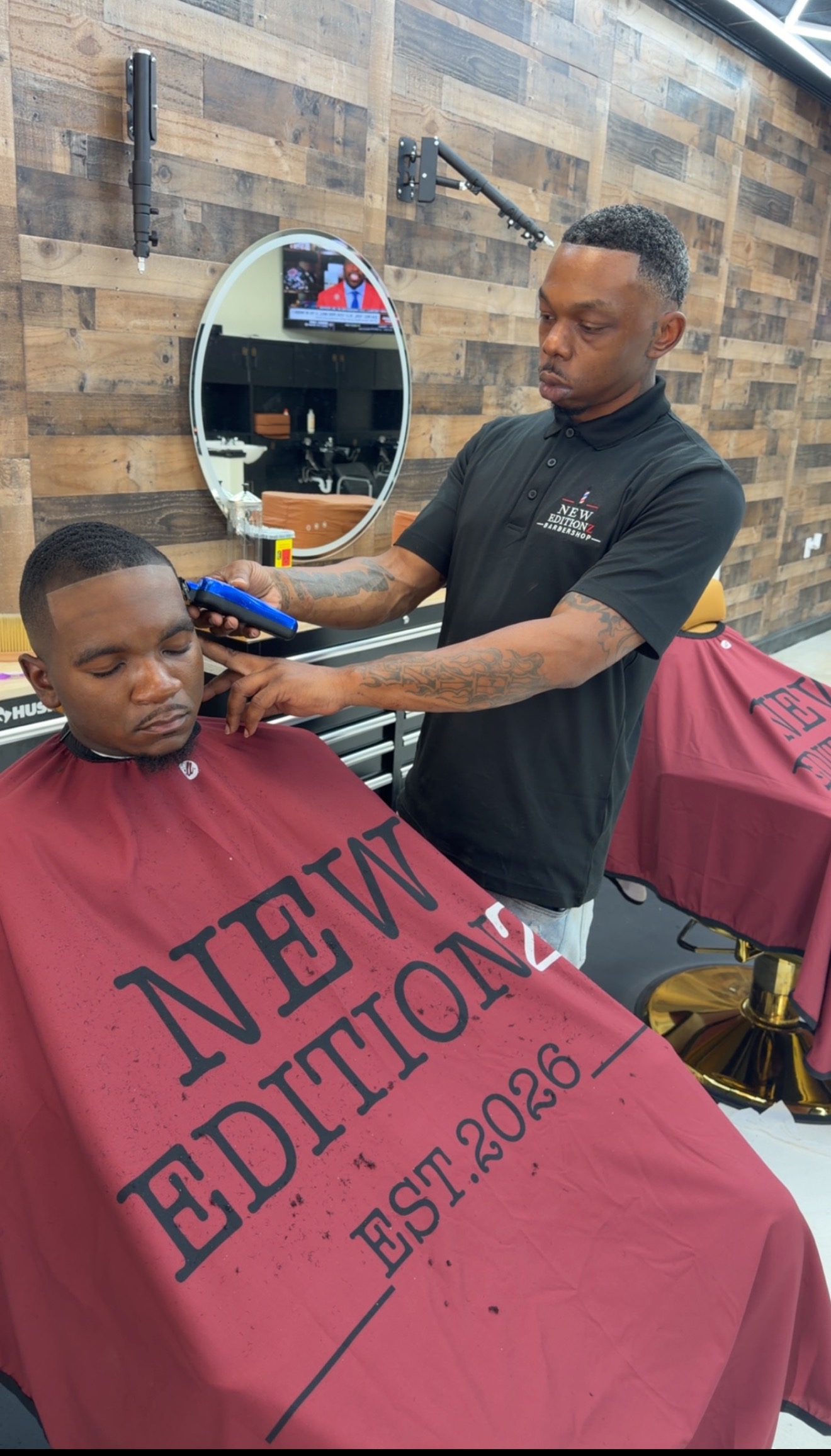 Chris C.T. Thomas inside the barbershop